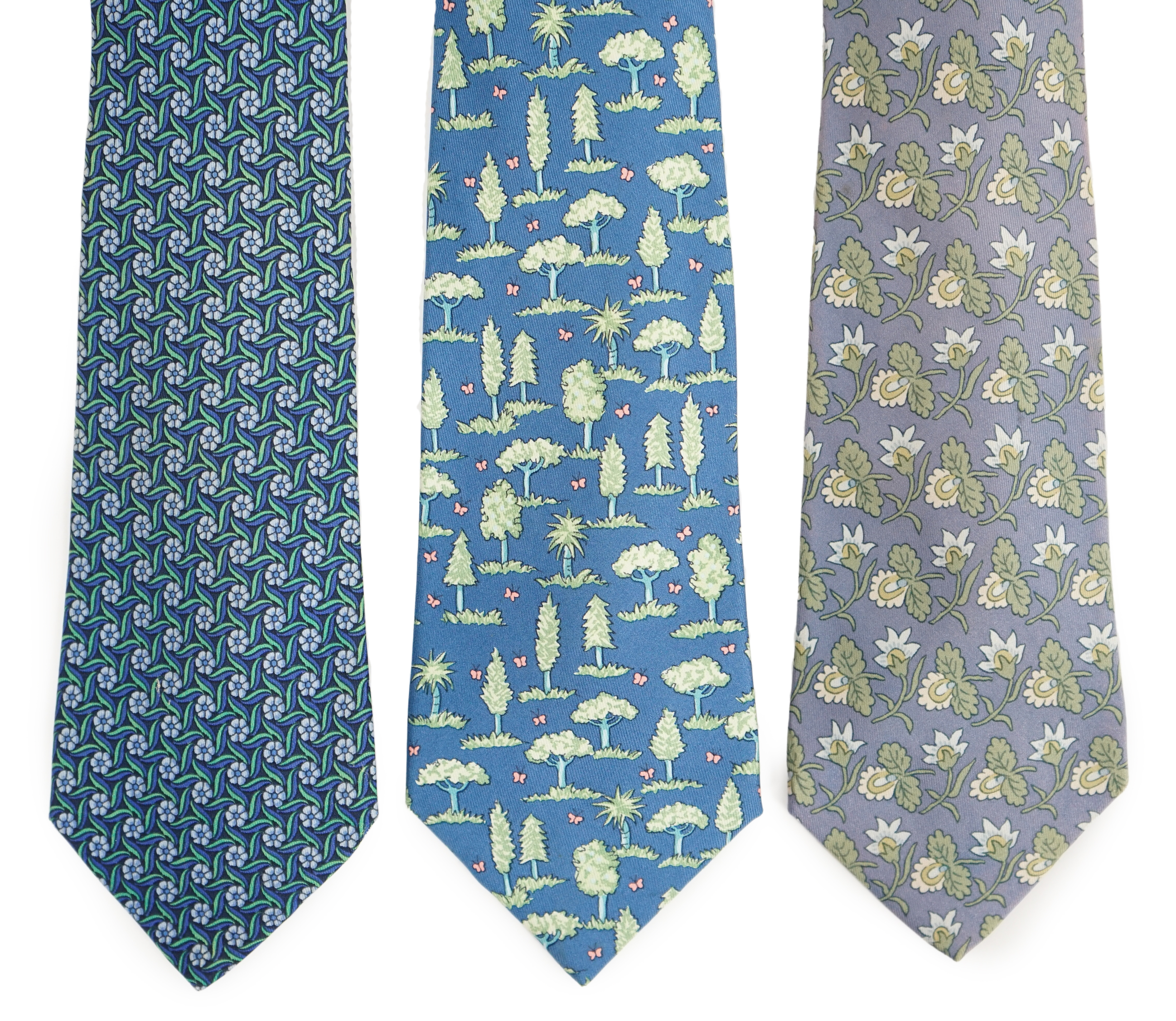 Three Hermès gentlemen's assorted patterned silk ties